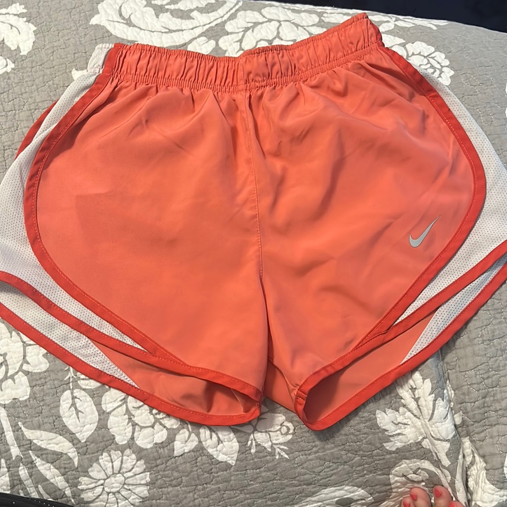 Nike coral colored running shorts size XS!